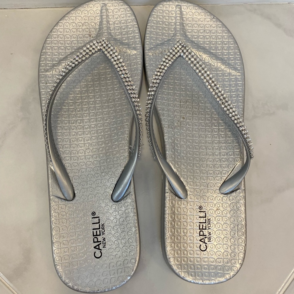 Silver flip flops
